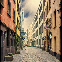 Buy canvas prints of A small street in Cologne, Germany, grunge effect by Frank Irwin