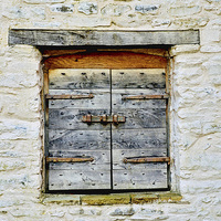 Buy canvas prints of An old door found in Conway, North Wales by Frank Irwin