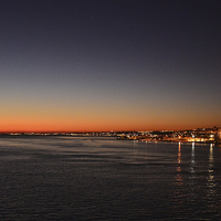 Buy canvas prints of Lisbon from the Tagus by night. by Frank Irwin
