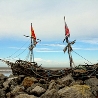 Buy canvas prints of The Driftwood Pirate ship ‘Grace Darling’. by Frank Irwin