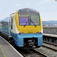 Buy canvas prints of An Arriva train at Deganwy Station by Frank Irwin