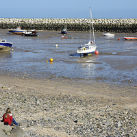 Buy canvas prints of Rhos-on-Sea harbour, tide out by Frank Irwin