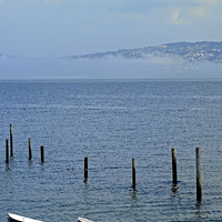 Buy canvas prints of Rhos-on-Sea with the tide right in by Frank Irwin