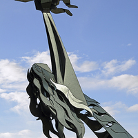 Buy canvas prints of The “Aim Higher” sculpture in Birkenhead Park. by Frank Irwin