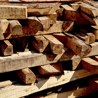 Buy canvas prints of Scrap timber stacked up by Frank Irwin