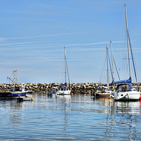 Buy canvas prints of A view of Rhos-on-Sea harbour by Frank Irwin