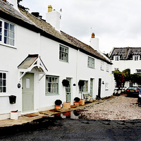 Buy canvas prints of Parkgate cottages artistically presented by Frank Irwin