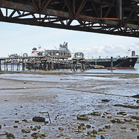 Buy canvas prints of The River Mersey’s Tranmere Oil Terminal by Frank Irwin