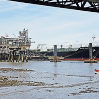 Buy canvas prints of The River Mersey’s Tranmere Oil Terminal by Frank Irwin