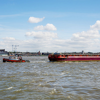 Buy canvas prints of  Towing a barge on the River Mersey by Frank Irwin