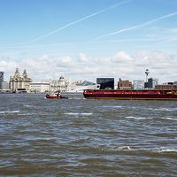 Buy canvas prints of Towing a barge on the River Mersey by Frank Irwin