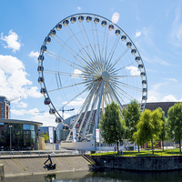 Buy canvas prints of  Liverpool's Ferris Wheel (Echo arena behind) by Frank Irwin