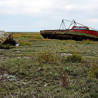 Buy canvas prints of  Abandoned and worse for wear boats by Frank Irwin
