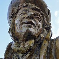 Buy canvas prints of Llandudno's Tree carving of The Mad Hatter by Frank Irwin