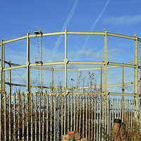 Buy canvas prints of  Partly demolished gas holder by Frank Irwin