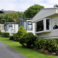 Buy canvas prints of Privately owned caravans on a site in North Wales by Frank Irwin