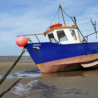 Buy canvas prints of  A yacht aground on Hoylake shore by Frank Irwin