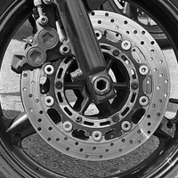 Buy canvas prints of  Motorcycle disc brake by Frank Irwin