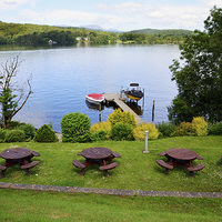 Buy canvas prints of  Windermere from a hotel garden by Frank Irwin