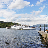 Buy canvas prints of  A cruise boat sets out on Windermere by Frank Irwin