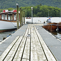 Buy canvas prints of  Boats moored to one of the many piers. by Frank Irwin