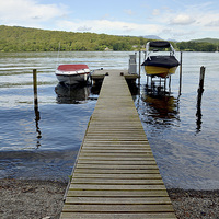 Buy canvas prints of  Mooring pier from a local lakeside hotel by Frank Irwin