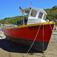 Buy canvas prints of  Fishing boat lies at anchor by Frank Irwin