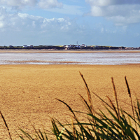 Buy canvas prints of Hilbre Island in the river Dee by Frank Irwin