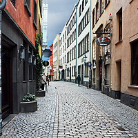 Buy canvas prints of A side street in Cologne by Frank Irwin