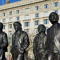 Buy canvas prints of Liverpool's "Fab Four" Liverpool PPeir Head statue by Frank Irwin