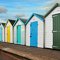 Buy canvas prints of Colourful Beach huts on Paignton sea front. by Frank Irwin