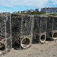 Buy canvas prints of Lobster pots at Caemis Bay, Anglesey by Frank Irwin