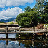 Buy canvas prints of One of the many piers on Derwent Water by Frank Irwin