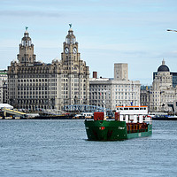 Buy canvas prints of MS Tomar manoeuvring in the River Mersey by Frank Irwin