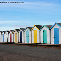 Buy canvas prints of Beach huts parallel to the coastline by Frank Irwin