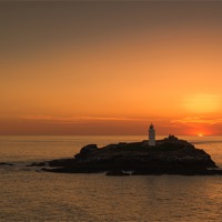 Buy canvas prints of Godrevy Lighthouse Sunset by Roger Byng