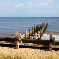Buy canvas prints of Hopton, Norfolk sea view by Ali Dyer