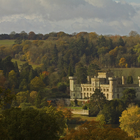 Buy canvas prints of Eastnor Castle in Autumn by Sue Dudley