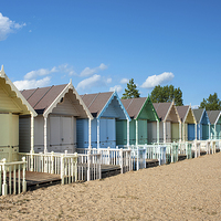 Buy canvas prints of West Mersea Beach Huts by Martin Parratt