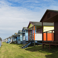 Buy canvas prints of Whitstable Beach Huts by Martin Parratt