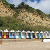 Buy canvas prints of Swanage Beach Huts by Martin Parratt