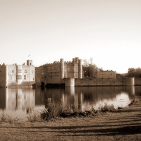 Buy canvas prints of Leeds Castle , Reflections in Sepia by Bill Lighterness