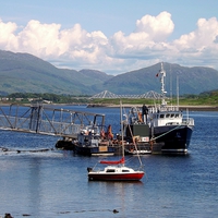 Buy canvas prints of  Boats Moored at Dunstaffnage Bay by Bill Lighterness