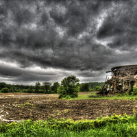 Buy canvas prints of Spring Rains on Farm Ruins by Mayo Fottral