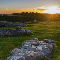 Buy canvas prints of Arbor Low Sunset by Laura Kenny