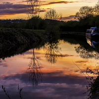 Buy canvas prints of  Canal Sunset by Laura Kenny