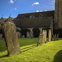 Buy canvas prints of Gravestones in Churchyard by Peter McCormack
