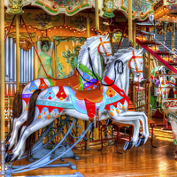 Buy canvas prints of Carousel Horses by Juha Remes