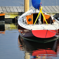 Buy canvas prints of Red boat and reflections Rockland Maine USA by Marianne Campolongo