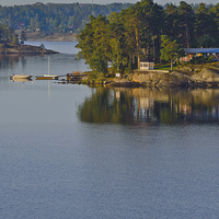 Buy canvas prints of Cottages and pleasure boats Stockholm Archipelago by Marianne Campolongo